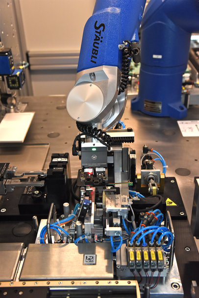 Robotic Assembly of Sensors in an Industry 4.0 Environment